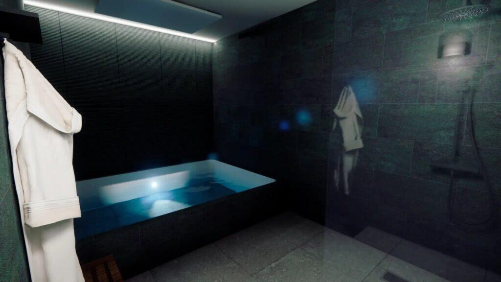 The open pool floatation room at being wellness centre in St Albans, showing the shallow float pool, shower, and robe