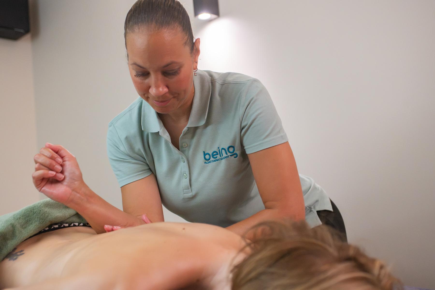 Therapist delivering a massage
